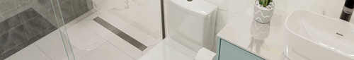 Vista superior de banheiro moderno com ralo linear slim de aço inox instalado no piso da área do box ao lado do vaso sanitário e bancada.