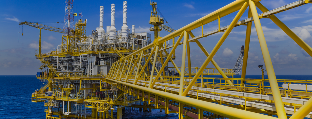 Banner showing oil refineries.